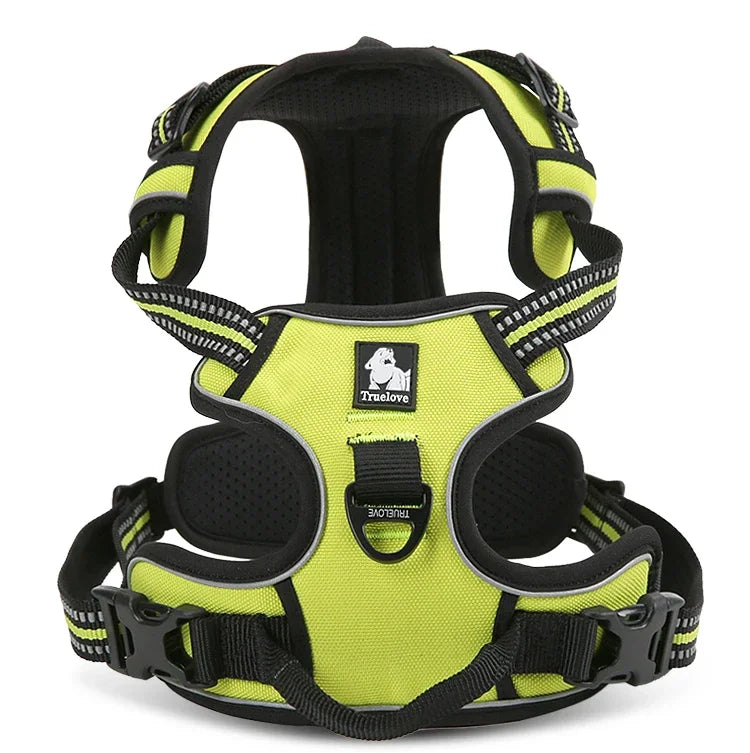 Yellow dog harness with black straps on a white background