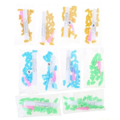 Nine small clear plastic bags containing colorful silicone earplugs, arranged in a 3x3 grid on a white background. The earplugs come in yellow, blue, green, and pink color combinations, with some bags showing the letter 'S' on the labels.