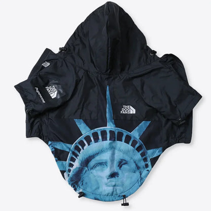Black jacket with Statue of Liberty design and The North Face logo on a white background