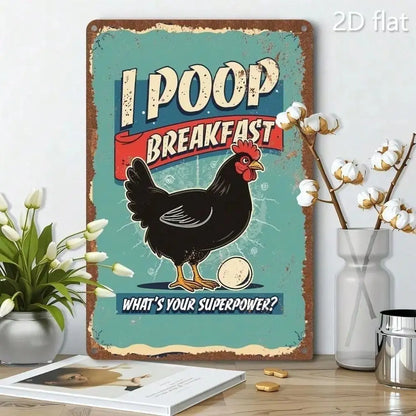 A rectangular decorative tin sign with a humorous chicken graphic and the text 'I POOP BREAKFAST' and 'WHAT'S YOUR SUPERPOWER?' displayed on a tabletop with flowers and a vase in a styled room setting.
