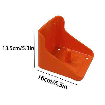 An orange plastic corner shelf or wall mount shown on a white background with dimension labels indicating 13.5 cm height and 16 cm width.