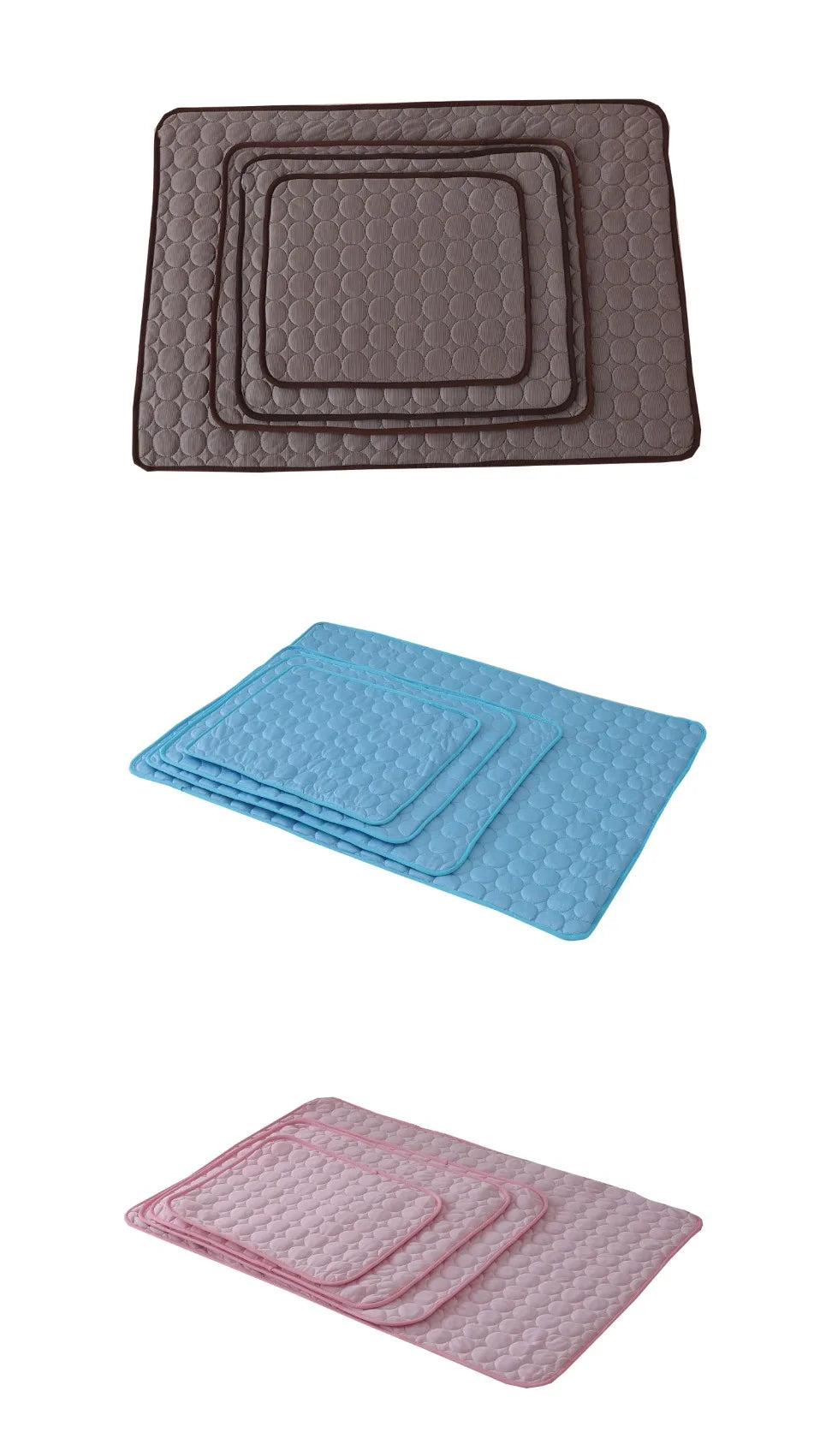 Set of three bath mats in brown, blue, and pink on a white background