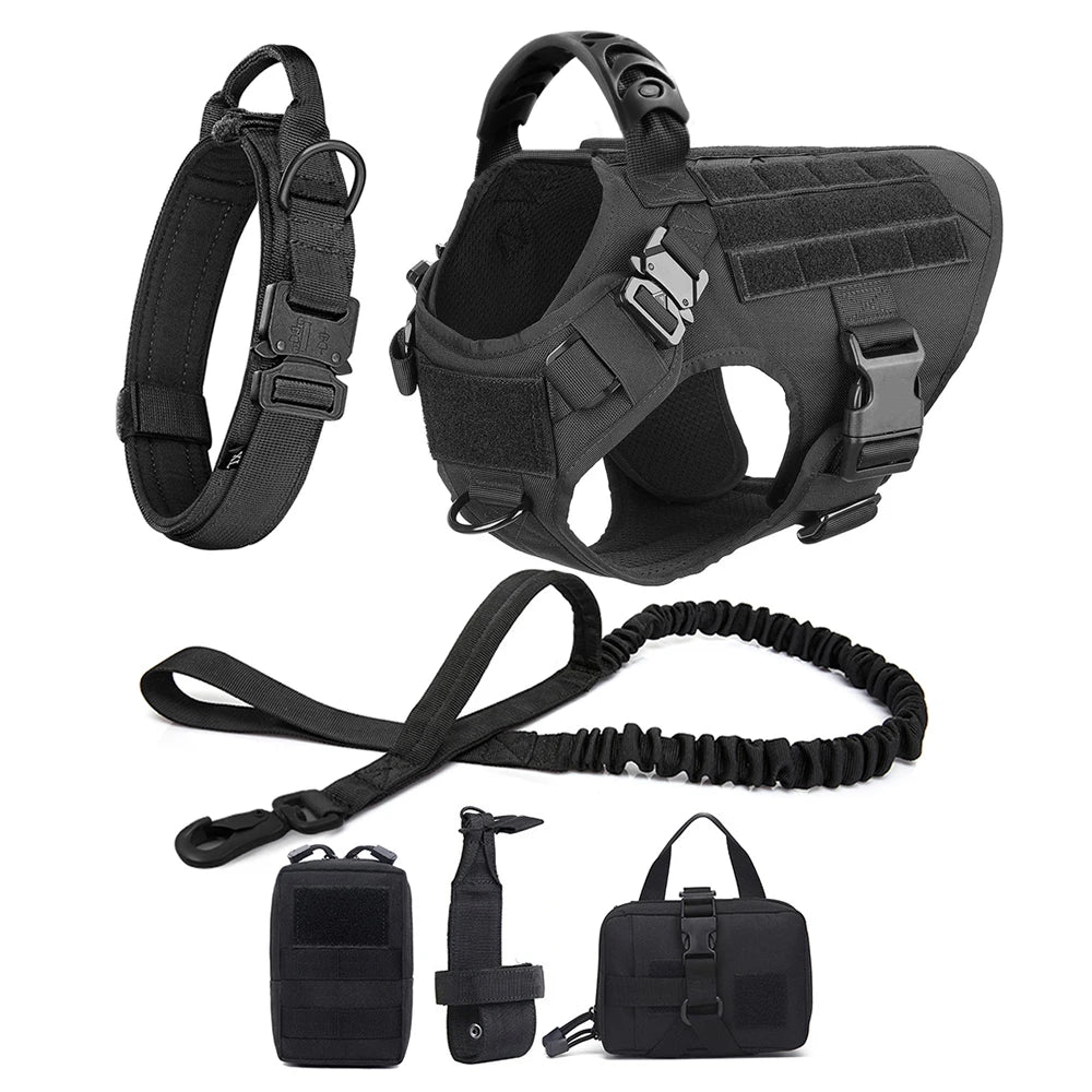 Black tactical dog harness with leash and accessories on a white background