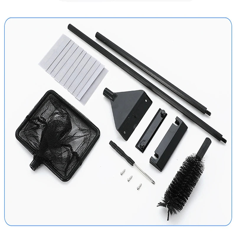 Collection of cleaning tools including a brush, squeegee, and various attachments on a white background.