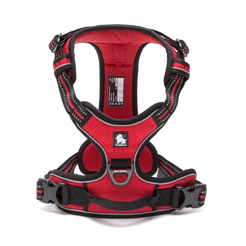 Red and black dog harness on a white background