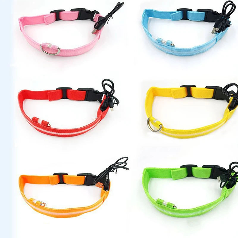 Six reflective dog collars in pink, blue, red, yellow, orange, and green, arranged in a two-column grid on a white background.