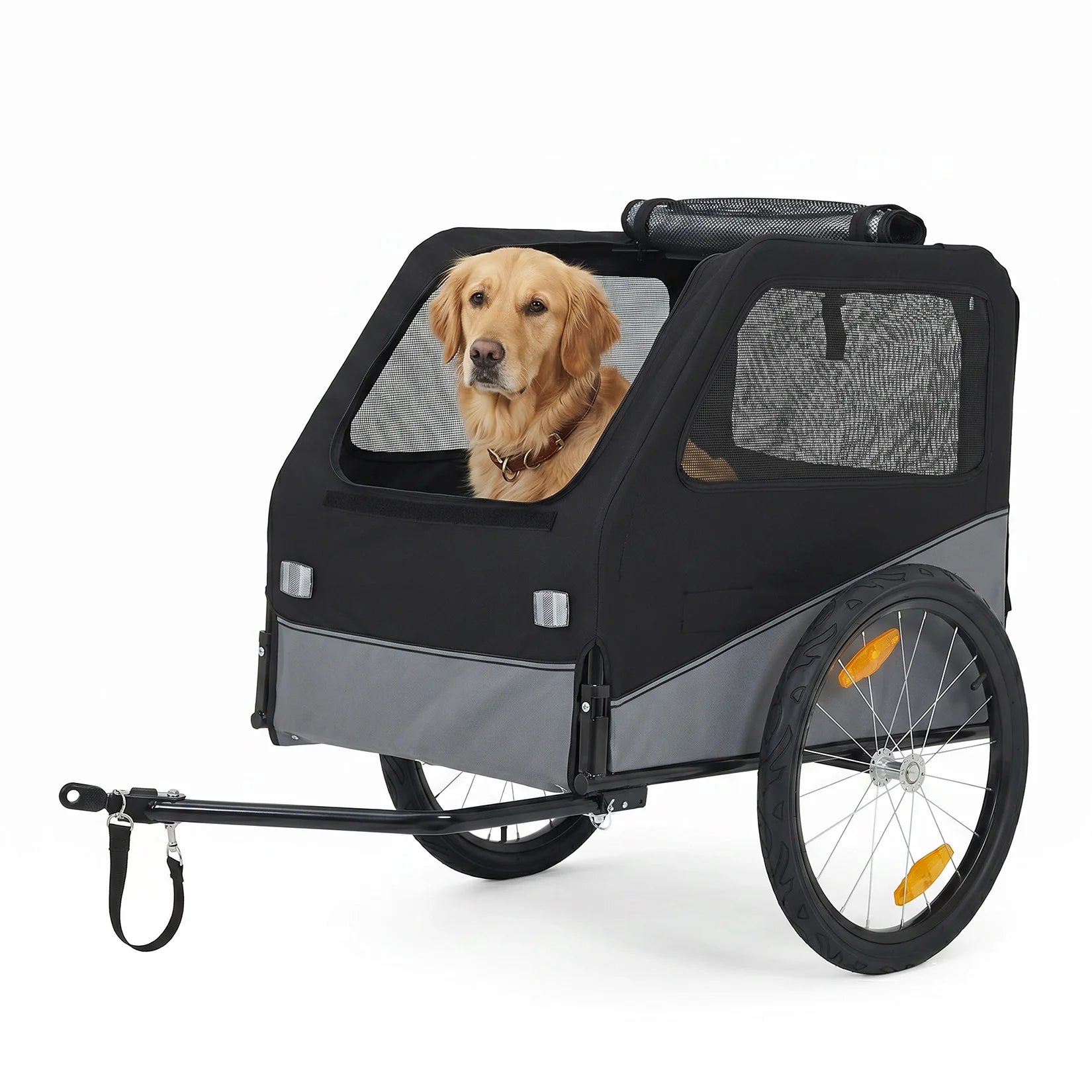 A black and gray pet trailer with mesh windows, shown on a white background with a golden retriever dog sitting inside.