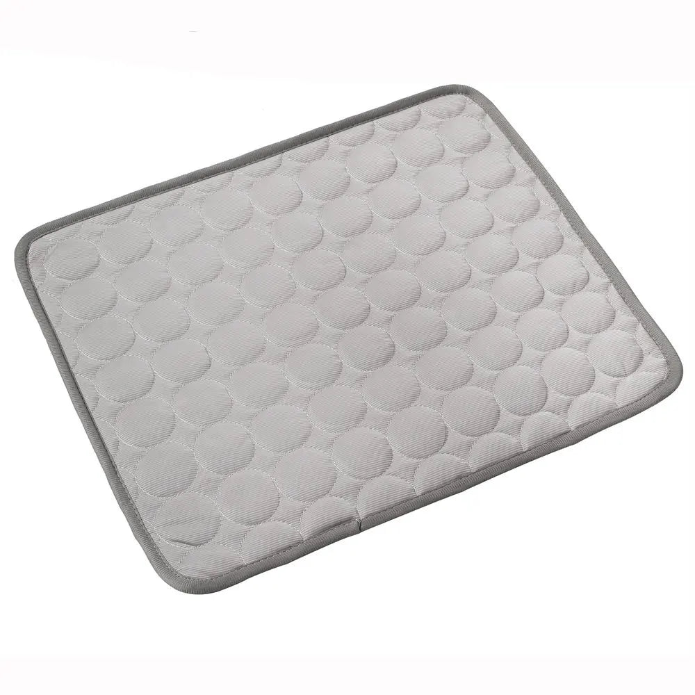 Gray bath mat with textured surface on a white background
