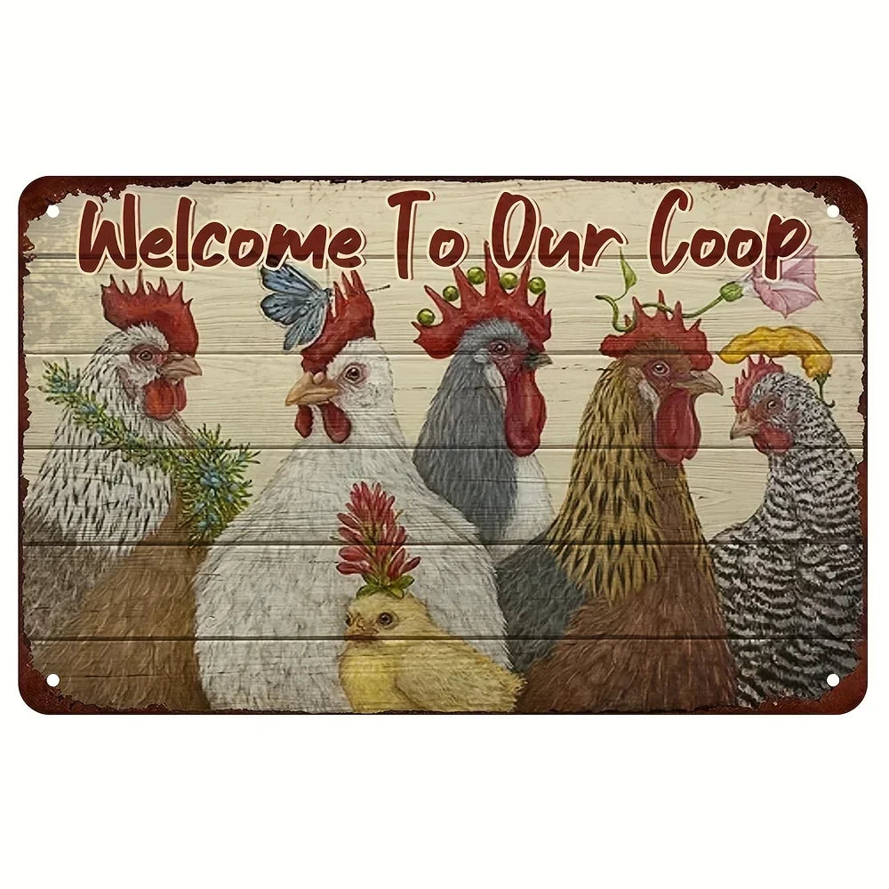 A rustic decorative metal sign with the phrase 'Welcome To Our Coop' in red lettering above a painted illustration of several chickens and a small chick on a whitewashed wood plank background.