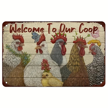 A rustic decorative metal sign with the phrase 'Welcome To Our Coop' in red lettering above a painted illustration of several chickens and a small chick on a whitewashed wood plank background.