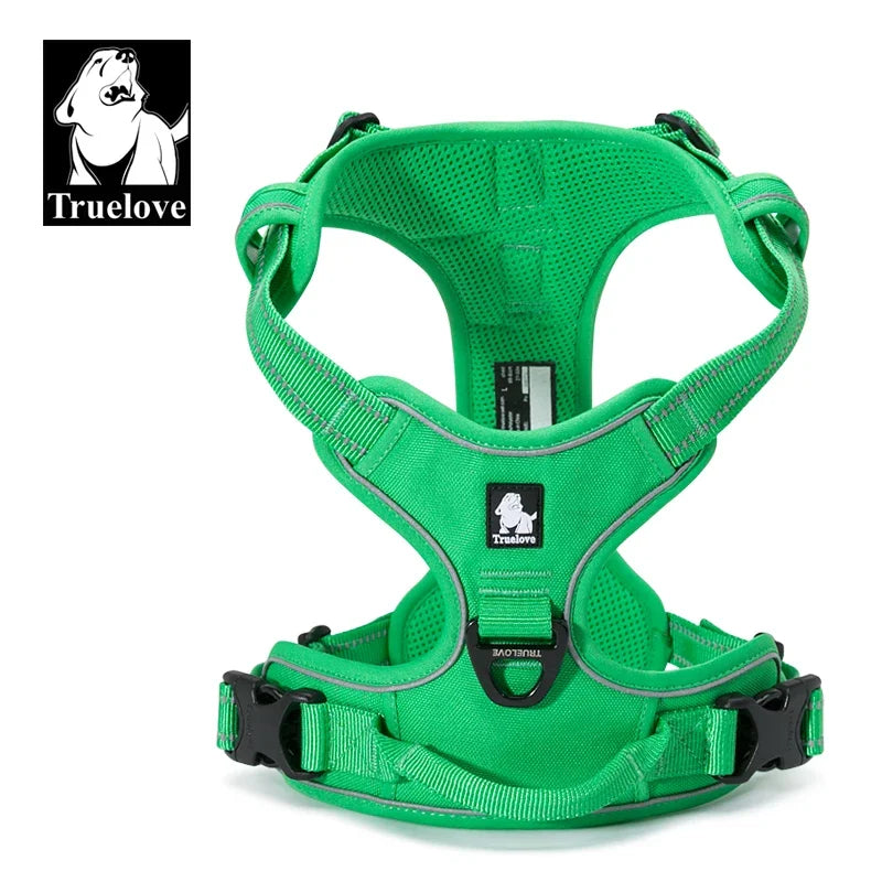 Green dog harness with reflective stripes on a white background, featuring the Truelove brand logo.