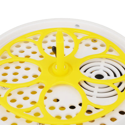 Close-up of a circular white plastic basket or tray with a bright yellow perforated overlay ring and central support post, shown on a white background.