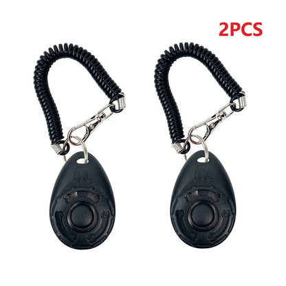 Two black self-defense keychain devices with coiled ropes on a white background, labeled '2PCS'.