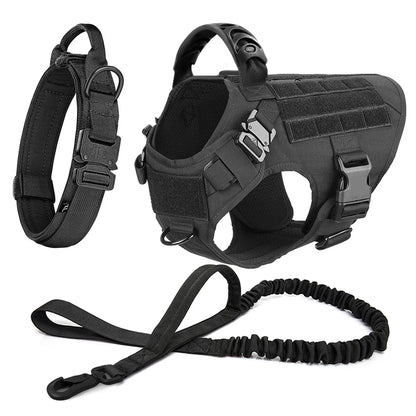Black tactical dog harness and leash set on a white background