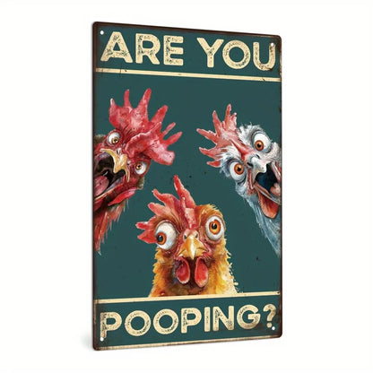 A rectangular decorative tin sign with a distressed dark teal background and the text 'ARE YOU POOPING?' in cream lettering. The sign features three cartoon-style chickens with wide eyes and open beaks in red, yellow, and white tones.