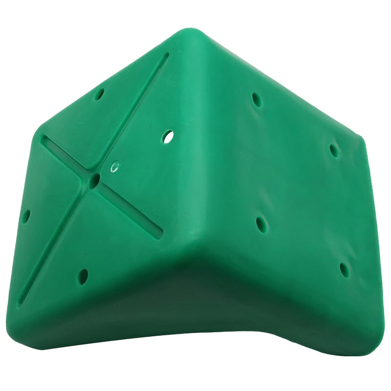 A green plastic climbing wall hold with multiple screw holes and textured surface details, shown on a plain white background.