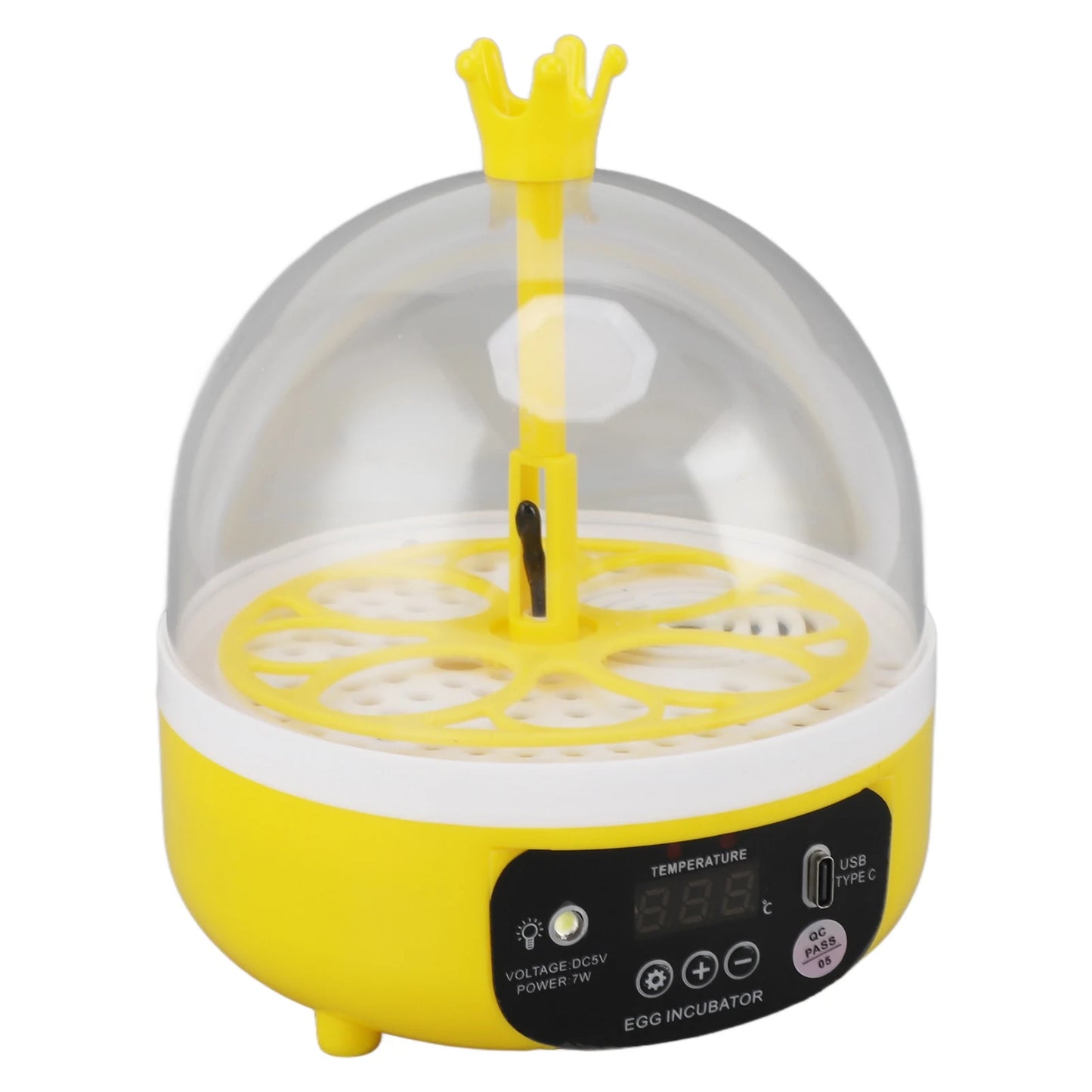 Yellow and white egg incubator with a clear dome lid, a small yellow crown on top, a central stand, and a black digital control panel on the front.
