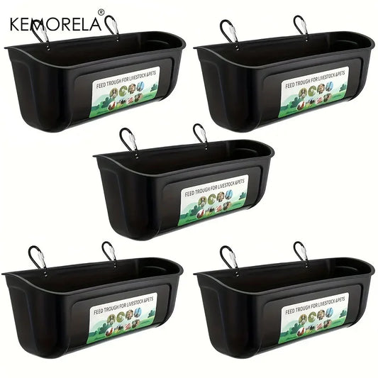 Five black plastic hanging bird feeders arranged on a white background, each with a metal hook and a label that reads 'FEED THROUGH LIVEFOOD APPETS.' The brand name KEMORELA appears in the top left corner.