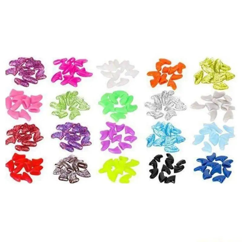 A set of small decorative hair clips or hair ties arranged in a grid on a white background, shown in multiple colors including pink, green, orange, yellow, white, silver, red, purple, black, and blue.