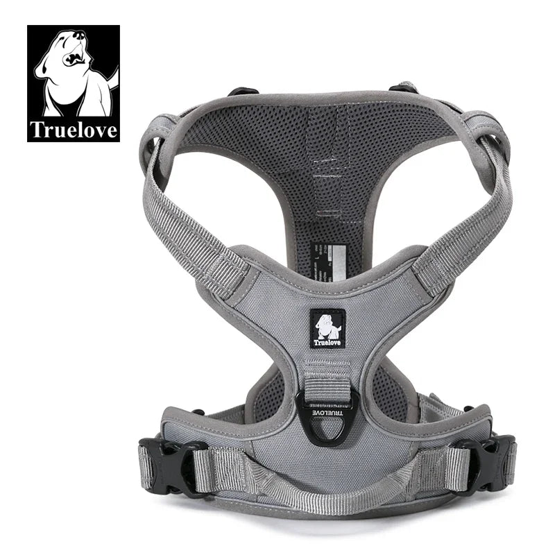 Gray dog harness with 'Truelove' branding on a white background