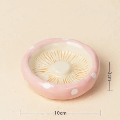Pink contact lens case with measurement details on a beige background