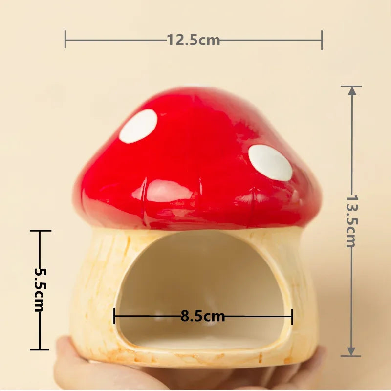 Mushroom-shaped pet house with dimensions on a beige background