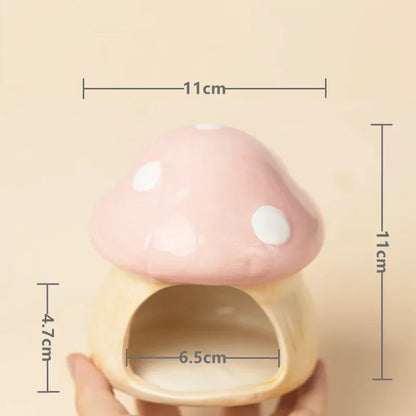 Pink and beige mushroom-shaped container with measurements on a beige background
