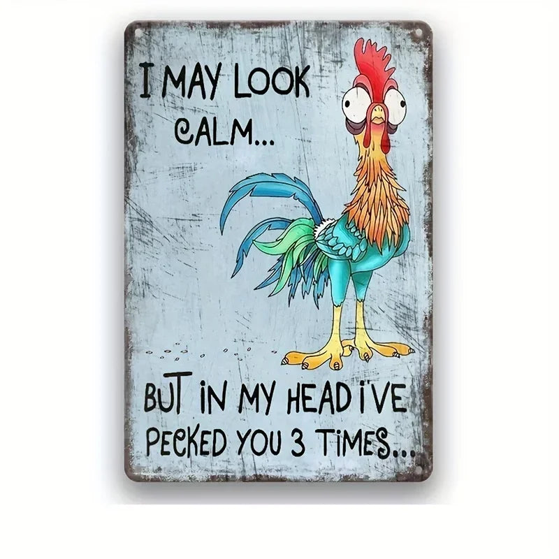 Metal sign with a cartoon rooster and humorous text on a white background