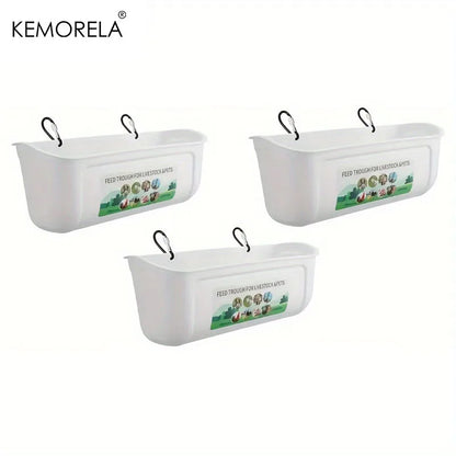 Three white plastic hanging planter boxes with black hanging loops, shown on a plain white background with the KEMORELA brand name in the top left corner.