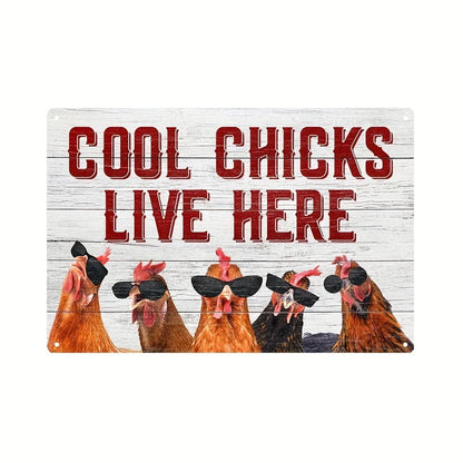 A rectangular decorative sign with rounded corners featuring the phrase 'COOL CHICKS LIVE HERE' in large red letters over a white wood-plank background, with five illustrated chickens wearing black sunglasses along the bottom.