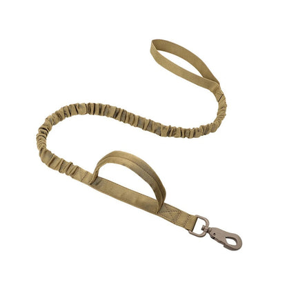 A tan elastic dog leash with a padded webbing handle and a silver metal snap hook, displayed on a solid white background.
