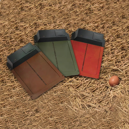 Three rectangular containers in brown, green, and red on a straw background