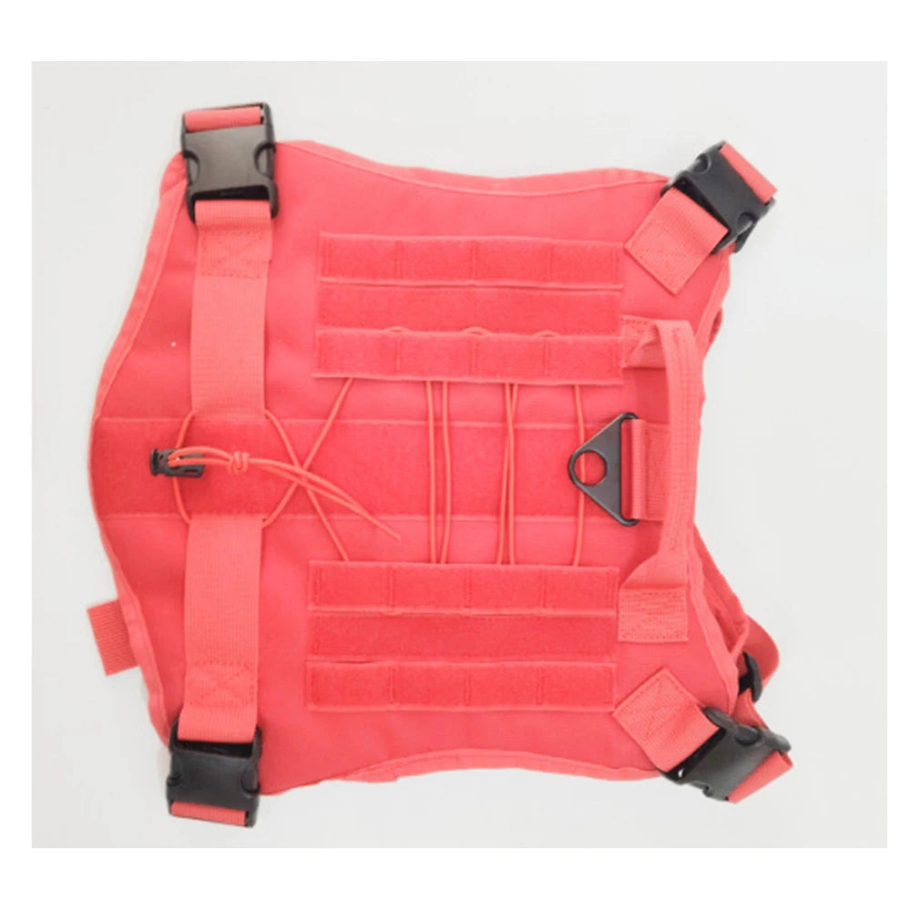 A coral red tactical vest or body armor carrier with multiple webbing loops, adjustable straps, and black plastic quick-release buckles, shown flat against a light gray background.