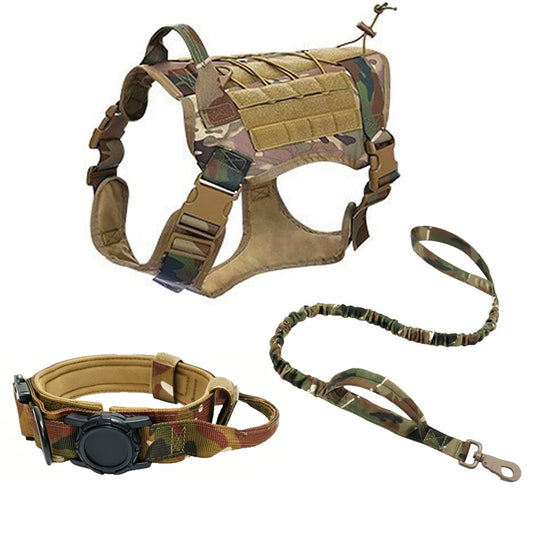 A tactical dog harness in camouflage pattern with a matching leash and a tan collar with a black electronic device, shown on a plain white background.